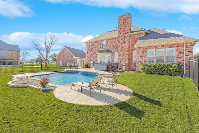 view of swimming pool featuring a fenced in pool, a patio, a lawn, and a fenced backyard