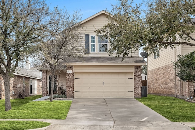 traditional-style home with brick siding, a front yard, an attached garage, and driveway