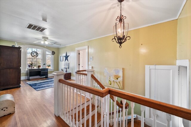300 5th St, Kerens, TX 75144 - sitting room with ceiling fan, attic access, baseboards, light wood-type flooring, and visible vents