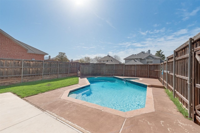 view of swimming pool featuring a fenced backyard and a patio area