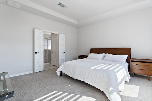 bedroom with baseboards, visible vents, and carpet floors