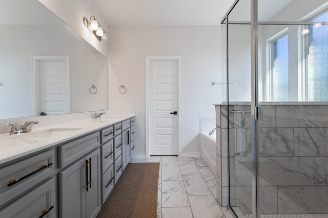 bathroom featuring double vanity, a stall shower, a bath, marble finish floor, and a sink