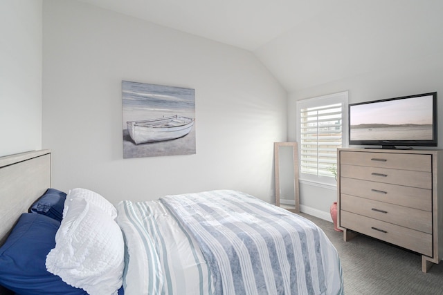 4152 Sanders Dr, Celina, TX 75009 - carpeted bedroom featuring baseboards and vaulted ceiling