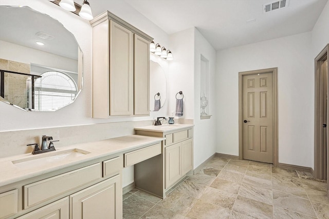 full bathroom with double vanity, visible vents, a shower stall, and a sink