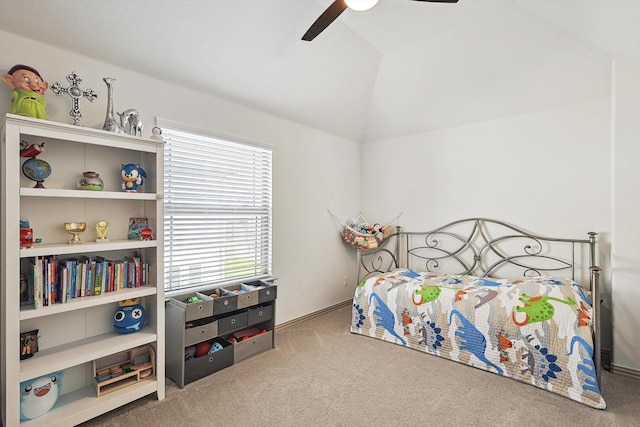 carpeted bedroom with lofted ceiling and a ceiling fan