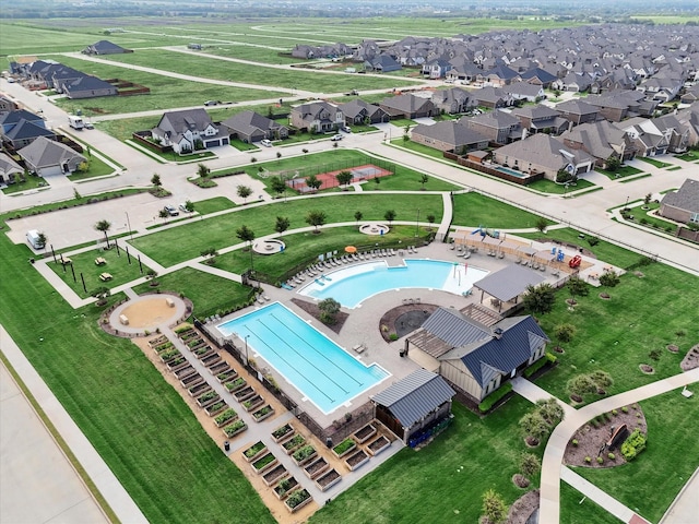 birds eye view of property with a residential view