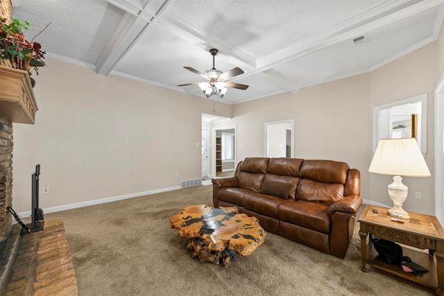 living area featuring visible vents, beamed ceiling, carpet, baseboards, and ceiling fan