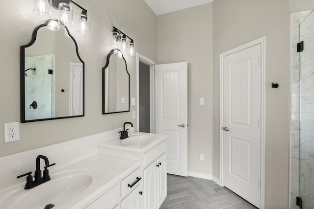 full bath with double vanity, a shower stall, and a sink