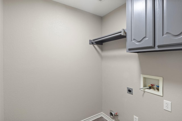 laundry room featuring hookup for a washing machine, baseboards, cabinet space, electric dryer hookup, and hookup for a gas dryer