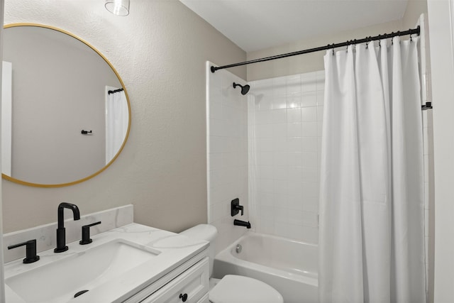 bathroom featuring shower / bath combo with shower curtain, toilet, vanity, and a textured wall