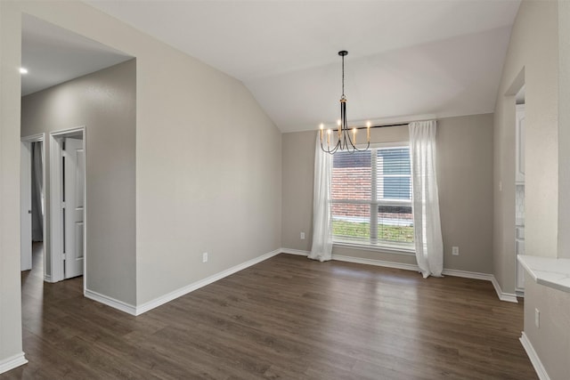 unfurnished dining area with baseboards, lofted ceiling, a notable chandelier, and dark wood finished floors