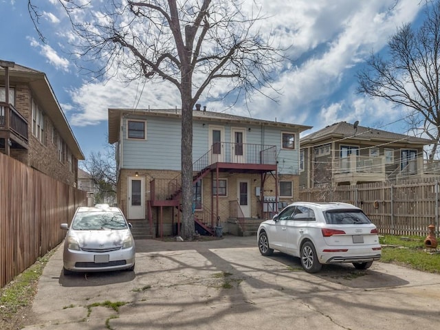 view of front of property with fence