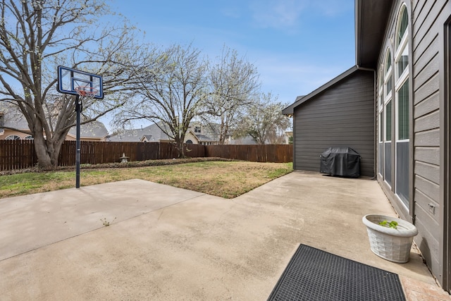 view of patio featuring grilling area and a fenced backyard