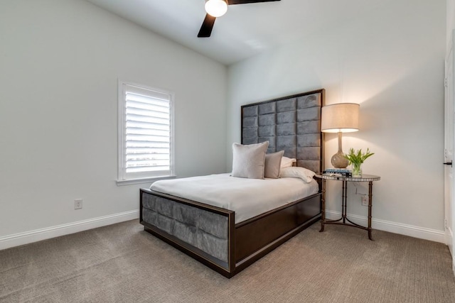 bedroom with carpet, baseboards, and ceiling fan