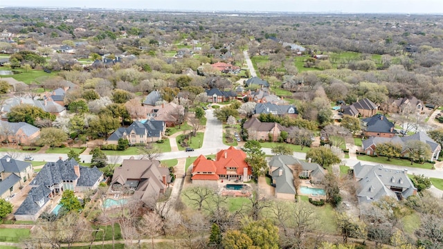 birds eye view of property with a residential view