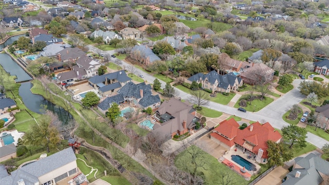 aerial view with a residential view and a water view