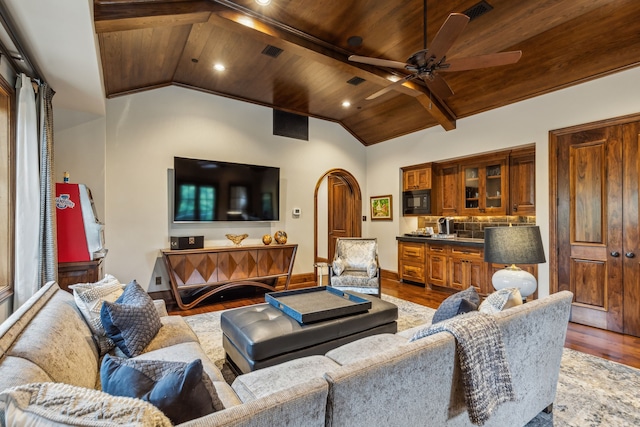 living room with wooden ceiling, wood finished floors, lofted ceiling, and ceiling fan