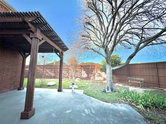 view of patio / terrace with fence and a pergola