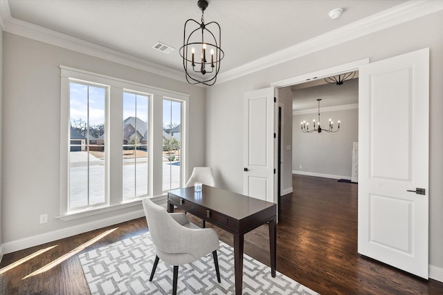 office space with baseboards, visible vents, dark wood finished floors, an inviting chandelier, and crown molding