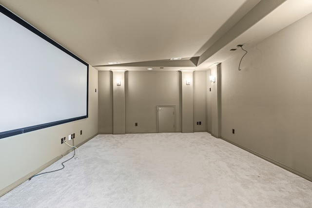 carpeted cinema with baseboards