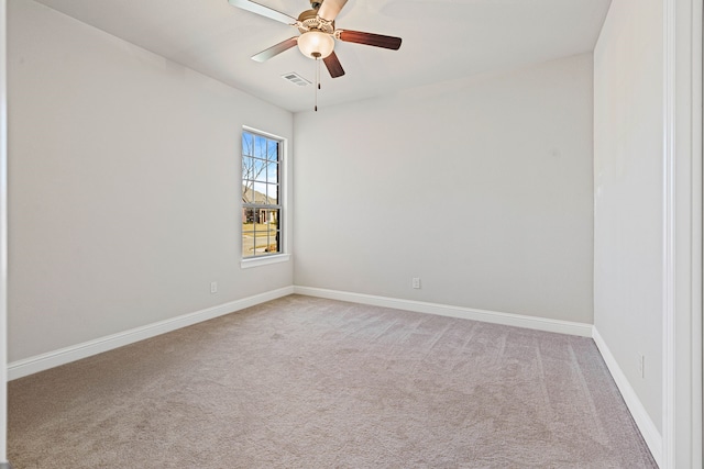 unfurnished room featuring visible vents, baseboards, ceiling fan, and carpet flooring