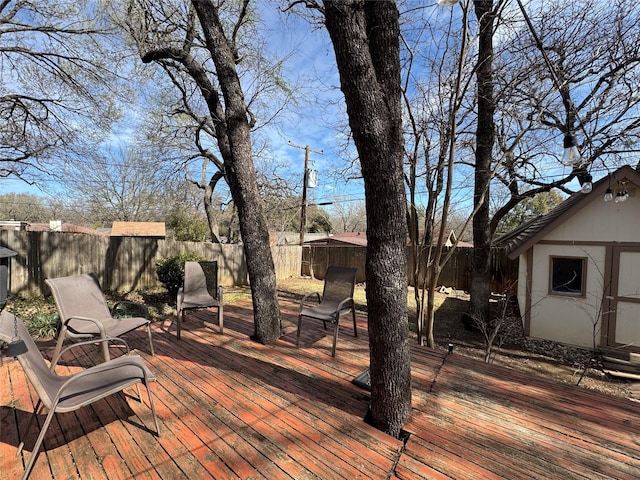 deck featuring a fenced backyard