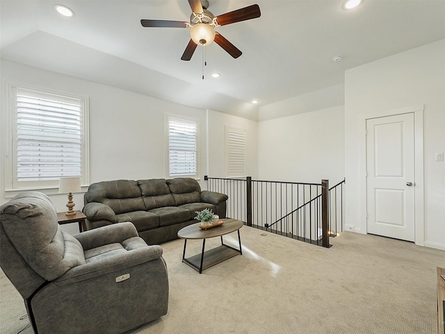 living room with recessed lighting, light carpet, and ceiling fan