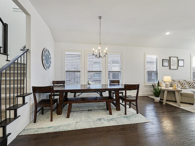 dining area with baseboards, stairs, recessed lighting, hardwood / wood-style flooring, and a notable chandelier