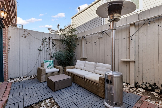 view of patio / terrace with outdoor lounge area and a fenced backyard