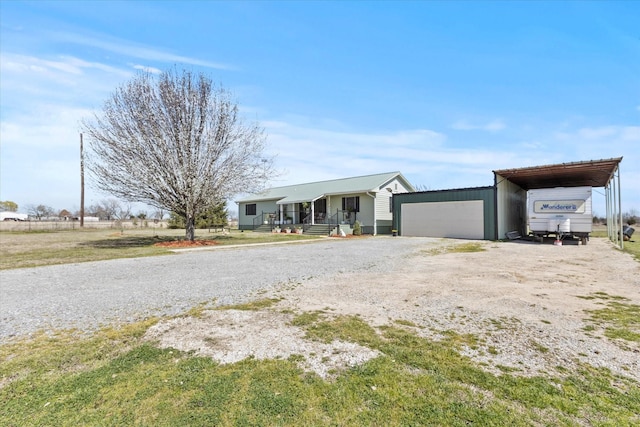 ranch-style house with an attached garage and driveway