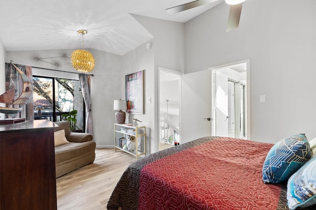 bedroom with high vaulted ceiling, light wood-style floors, and a ceiling fan