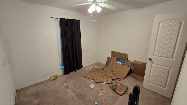 carpeted bedroom featuring a ceiling fan and baseboards