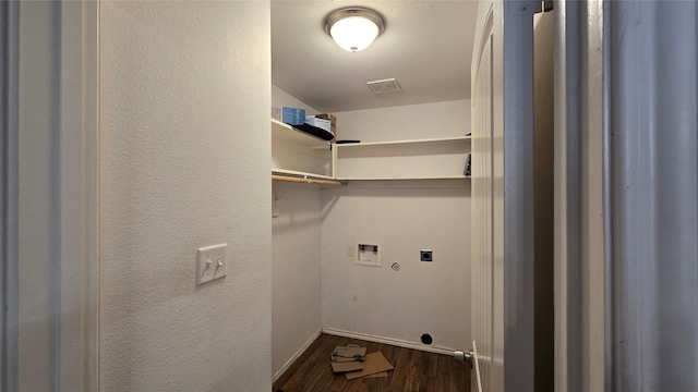 laundry area featuring visible vents, laundry area, dark wood-style flooring, electric dryer hookup, and washer hookup