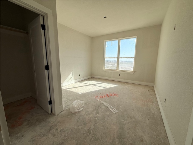 unfurnished bedroom with baseboards