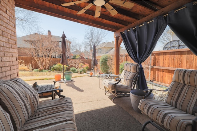 view of patio / terrace featuring a fenced backyard and ceiling fan