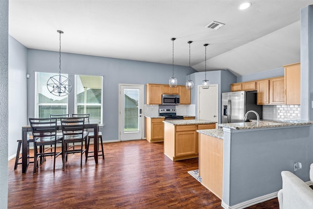 kitchen featuring visible vents, appliances with stainless steel finishes, dark wood finished floors, and light brown cabinetry