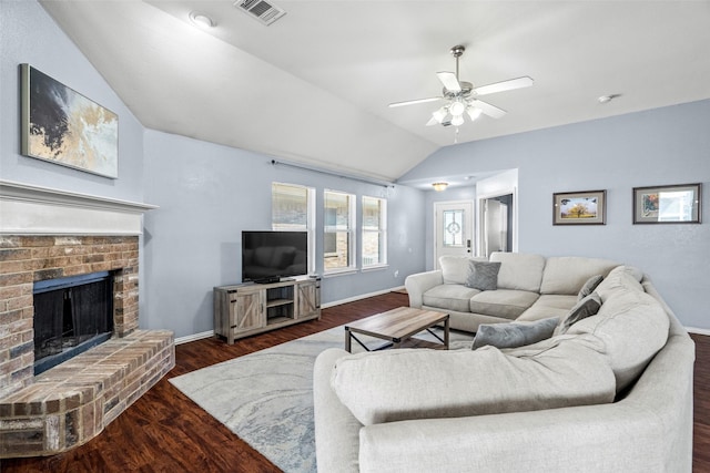 living area featuring visible vents, wood finished floors, baseboards, lofted ceiling, and ceiling fan