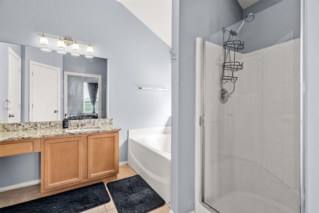 full bath with vanity, a bath, a stall shower, and tile patterned flooring