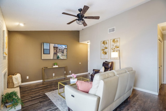 living room featuring visible vents, wood finished floors, ceiling fan, and vaulted ceiling