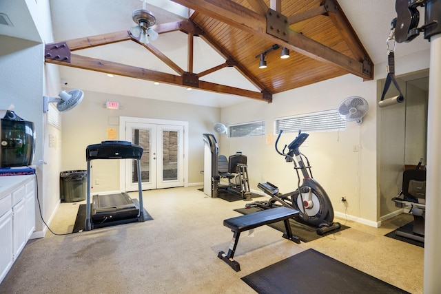 workout area featuring visible vents, lofted ceiling, french doors, baseboards, and wood ceiling