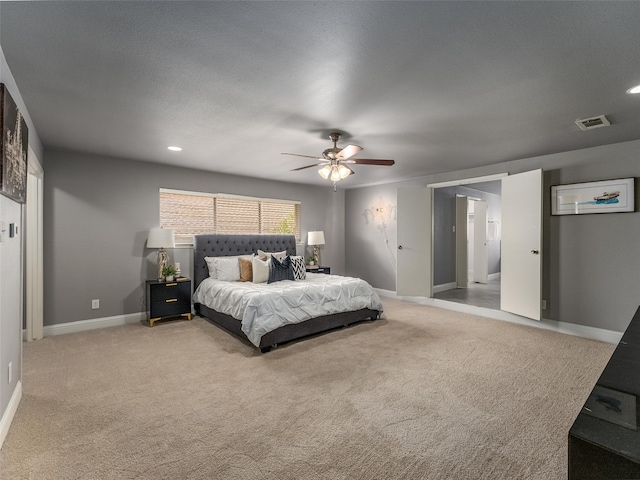 bedroom featuring visible vents, light carpet, recessed lighting, baseboards, and ceiling fan