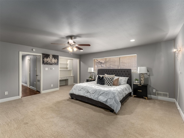 bedroom with baseboards, visible vents, recessed lighting, ceiling fan, and carpet flooring