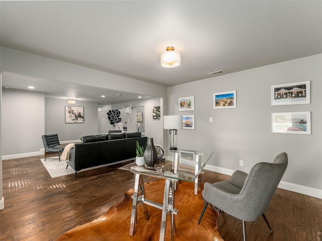 dining room featuring recessed lighting, wood finished floors, visible vents, and baseboards