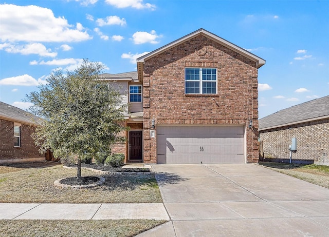 traditional-style house featuring brick siding, driveway, and an attached garage