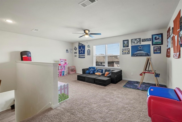 game room with visible vents, ceiling fan, baseboards, and carpet