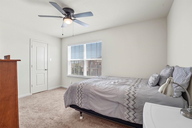 bedroom featuring carpet flooring, a ceiling fan, and baseboards