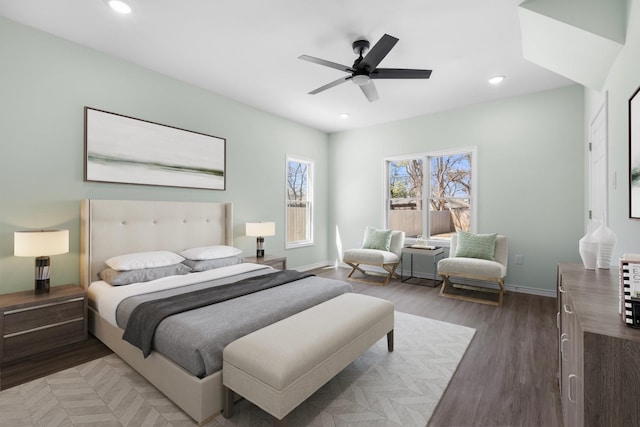 bedroom featuring a ceiling fan, recessed lighting, light wood-style floors, and baseboards