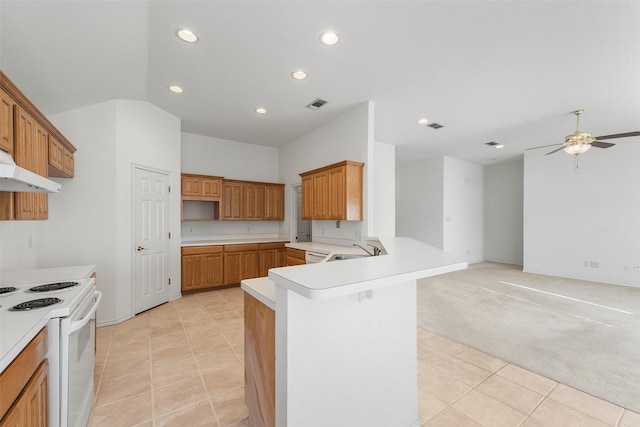 kitchen featuring visible vents, open floor plan, light carpet, electric stove, and a ceiling fan