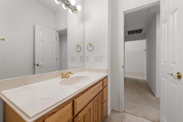 bathroom with tile patterned floors, visible vents, and vanity