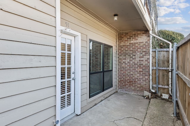 view of patio / terrace with fence